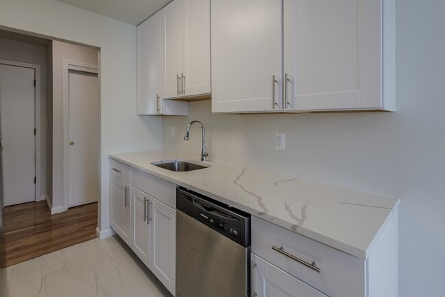 Elevate your living at Stanford Court Apartments with our modern kitchens featuring sleek cabinetry and stainless steel appliances. Enjoy convenience and style in every detail. Schedule a tour today and see your new home!