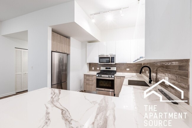 Photo - Spacious South Loop 2Bed/2Bath feat. Updated Kitchen & Large Patio! Unit 203