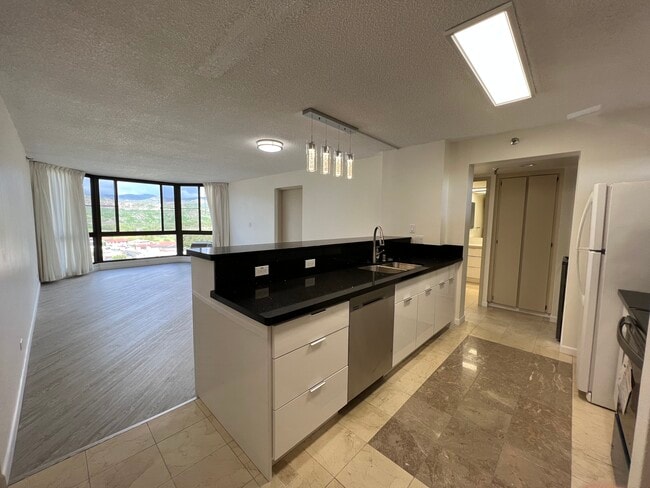 Building Photo - 5070 Likini St Unit 1211