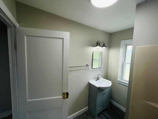 Photo - Fall 2024 remodel! Brand new cabinets, countertops, vanity etc!