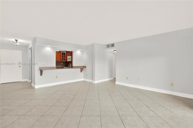 Photo - 1335 W 68th St Unit 207