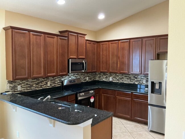 Photo - Florida Living at Its Best: 4 Bed, 3 Bath,...