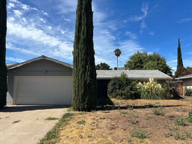Building Photo - 4 Bedroom 2 Bath Home Freshly Painted With New Landscaping Underway