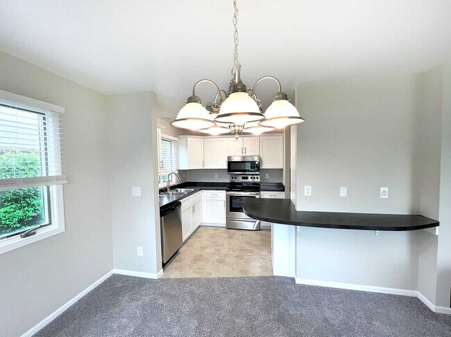 Condo kitchen with bar