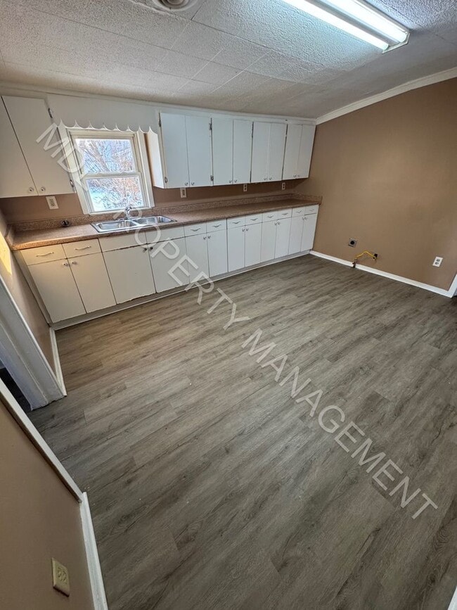 Photo - Charming 2-Bedroom Home with Bonus Room, Spacious Kitchen & Great Outdoor Space