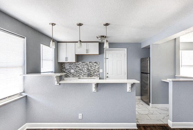 Photo - Plaza East Townhomes and Apartments