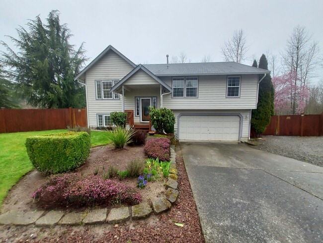 Photo - 4 bedroom 2.75 bath, Huge Fenced Yard with Landscaping Included!!