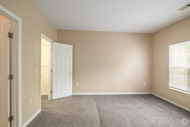 2BR, 2BA - 1,123SF - Primary Bedroom - Summit Rise Apartments