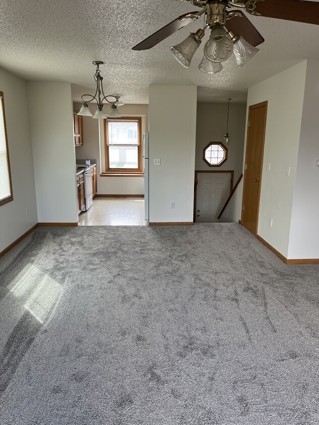 Living room facing dining area and kitchen - 2115 14th St (Coralville, IA)