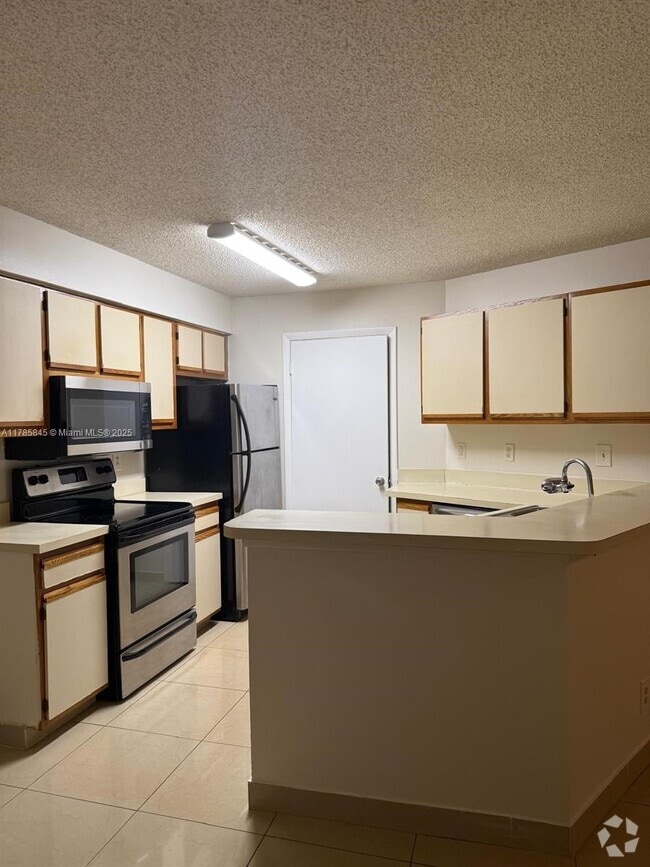 Building Photo - 9999 Summerbreeze Dr Unit 1016 Rental