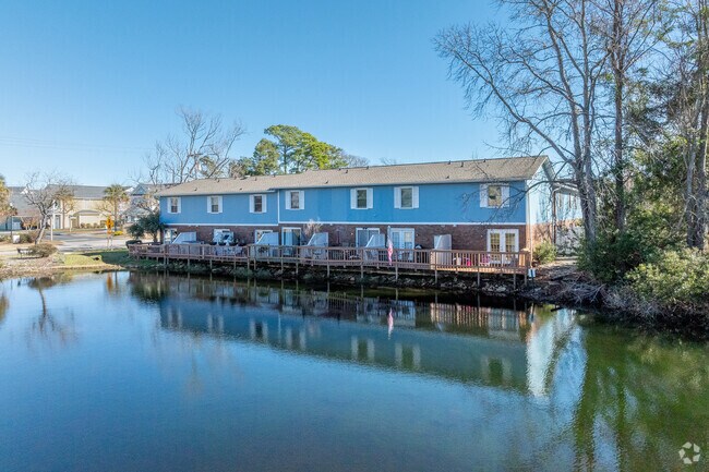 View from lake. - Lakeside Court Condominiums