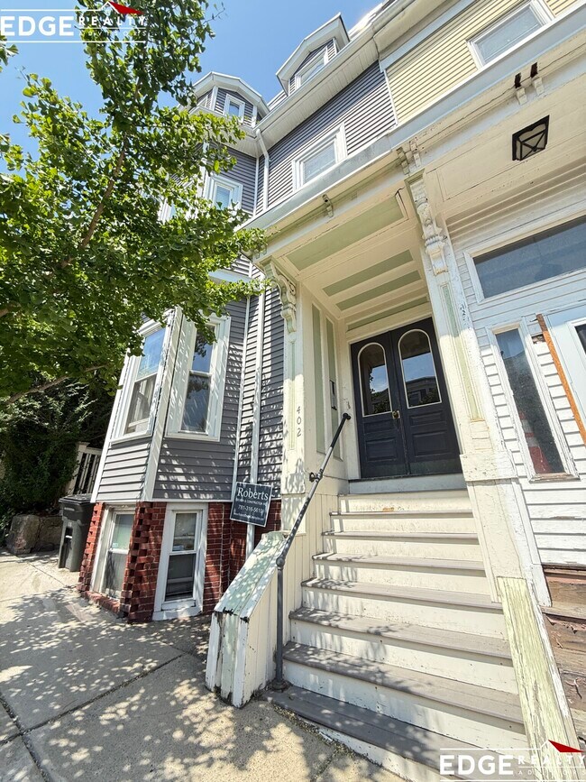 Building Photo - 402 E 7th St Unit 1 Rental