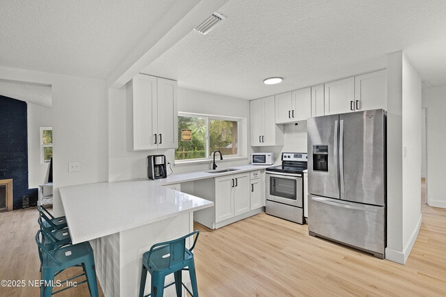 Building Photo - 7059 Tynan Ave