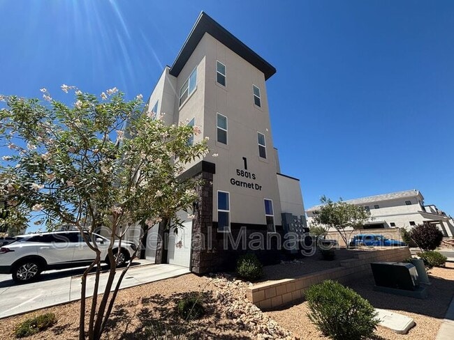 Building Photo - 5801 S Garnet Dr Unit #1-201 Rental