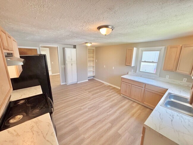 Photo - Spacious 5bd single family home | Off Street Parking | Updated kitchen