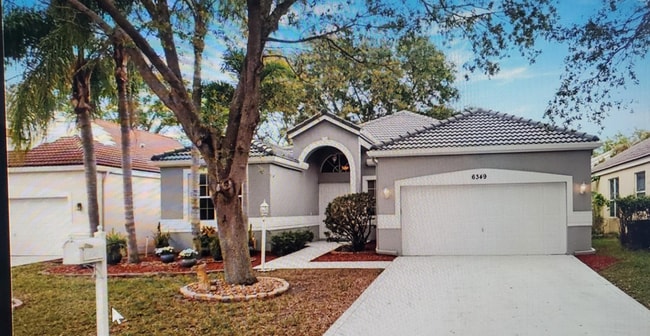 Building Photo - 6349 NW 78th Dr Rental