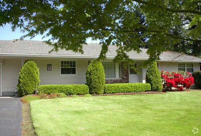 Building Photo - Spacious Yard and Home