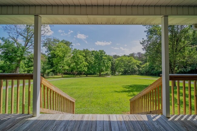 Photo - SHORT TERM - Spacious 3-Bedroom home with Wrap-Around Porch