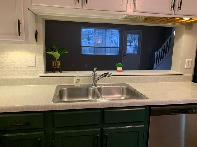 Kitchen pass to living room - 7747 Kelley Ct