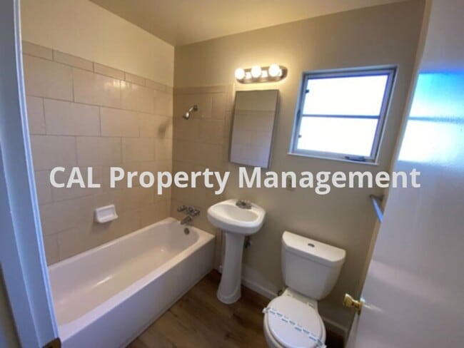 Photo - Charming 3-Bedroom, 2-Bathroom Home with Fireplace & Fenced Backyard