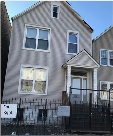 Building Photo - 4536 S Wood St Unit 1F