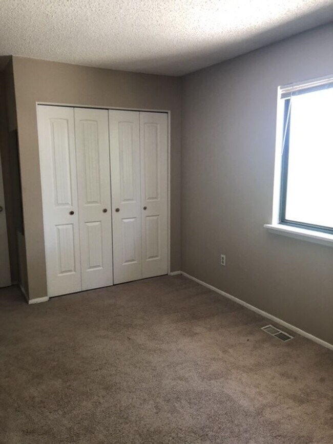 Photo - Charming 3-Story Townhome with Stunning Mountain Views & Open Space Privacy | Lafayette, CO Unit 166