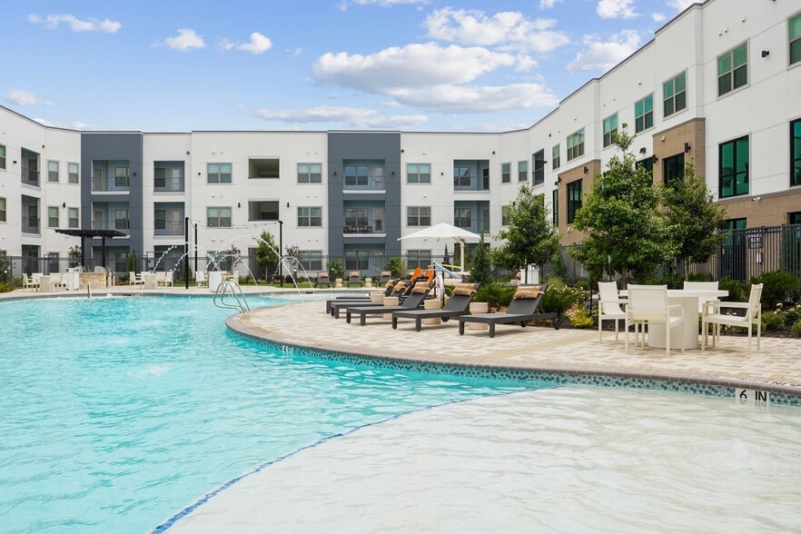 Salt-Water Pool - Resort-style pool with sun shelf, cabanas and grills for relaxing and entertaining close to home.