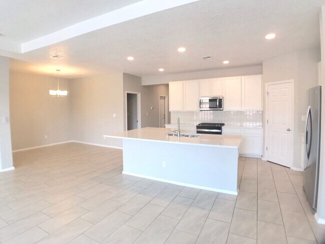 Photo - Los Lunas 3 bedroom! Tile Throughout! Refrigerated Air! Spacious living area
