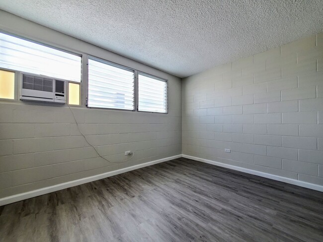 Photo - Available Now | Unfurnished 1 Bedroom, 1 Bath 2nd Floor Walk-up with 1 Assigned Parking Stall