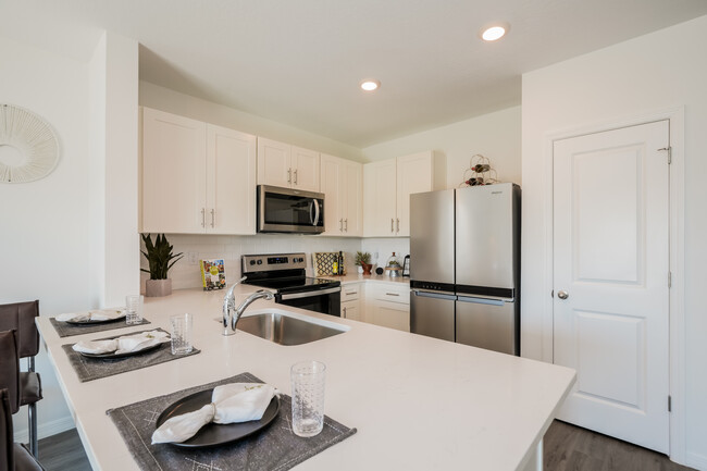 Cocina de casa modelo - Woodsdale Landing