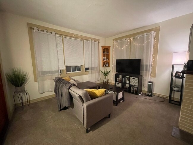 A large living room - 506 N McKean St Unit 2 bedroom