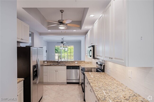 Building Photo - 5068 Annunciation Cir Unit 209 Rental