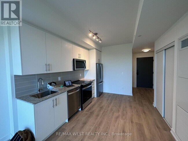 Photo - 409 Wheat Boom Dr. Unité 409