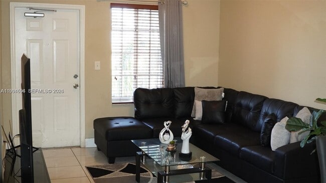 Building Photo - 6940 NW 179th St Unit 308-7