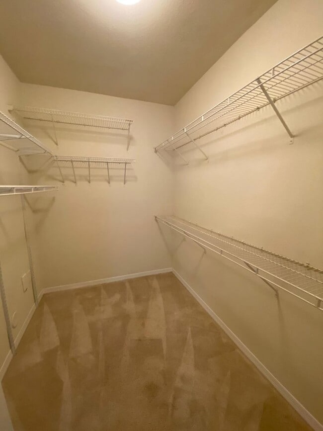 Building Photo - Spacious 2BR/2BA First-Floor Condo with Garage