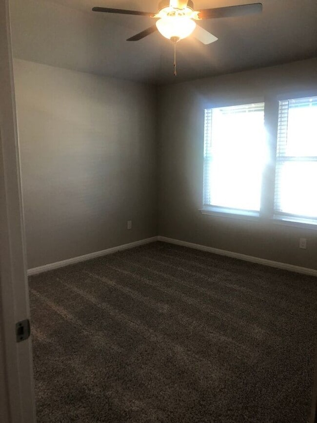 Photo - -=Available April 2026=-  4BR/2BA w/ Fenced Yard + Covered Parking in Hutto, TX