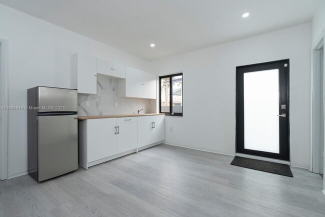 Photo - 511 NW 59th Ave Unidad 2