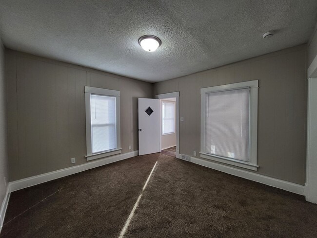 Photo - Two bedroom home with partially fenced yard!