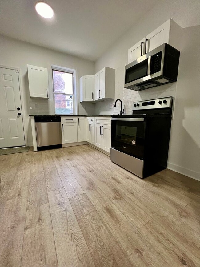 Photo - Newly Renovated 3-Bedroom Townhouse in Elmwood Park! Available mid-May! PHA VOUCHERS ACCEPTED!