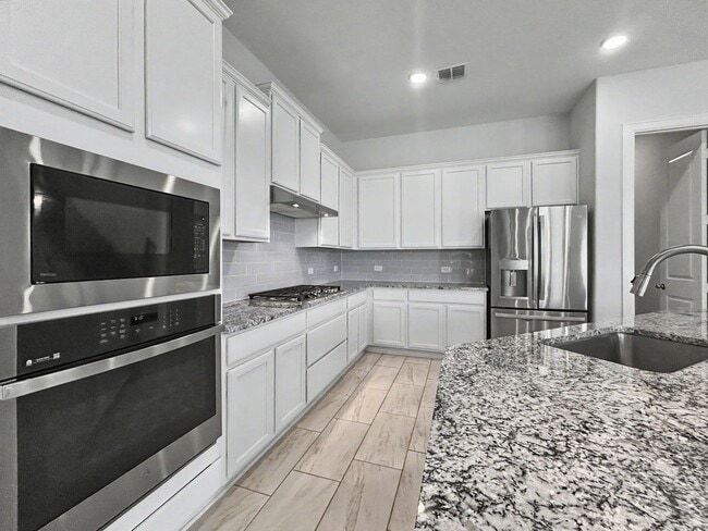 Photo - Modern Elegance in Cibolo Canyons | 4 Bed | 3.5 Bath | 3-Car Tandem Garage