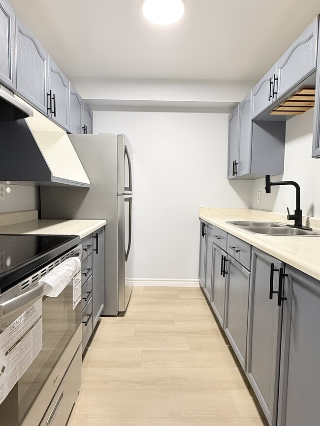 Building Photo - 2940 Elsmere Ave Unit 105