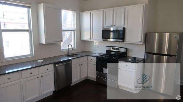 Building Photo - 3 bedroom in CHICAGO IL 60647 Unit 2R Rental