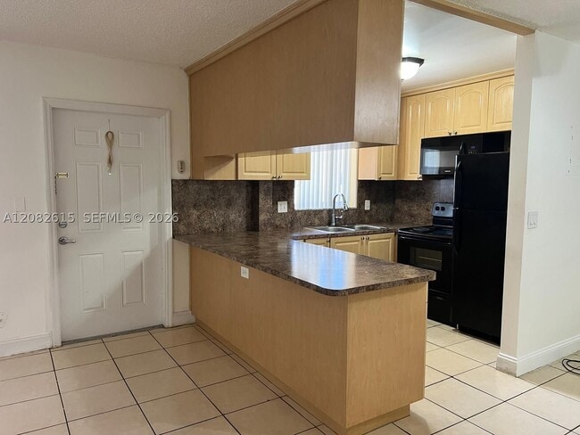 Photo - 7910 Taft St Unit 201