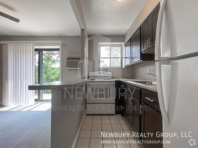 Building Photo - 1459 Poplar St Unit Apt. 23