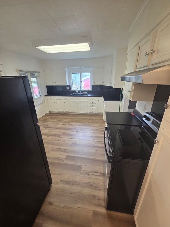 Photo - 606 N 60th Ave W Unit Lower