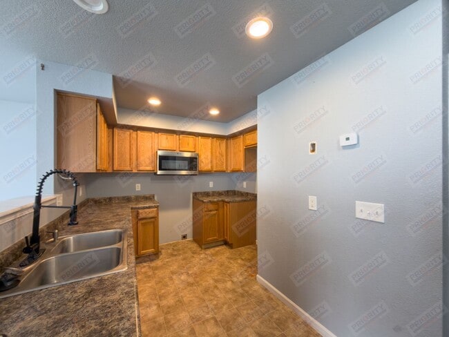 Photo - 3 bed, 2.5 bath townhouse with a 2 car garage