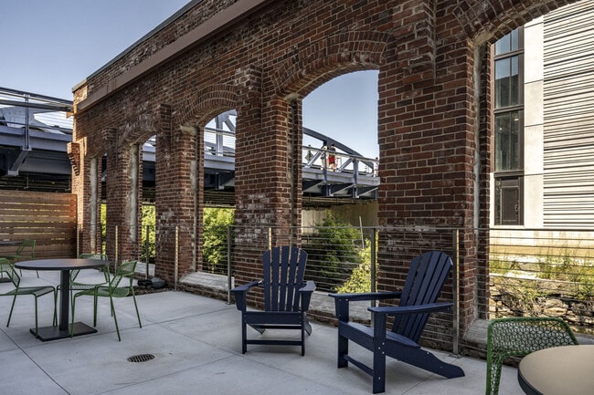 Canal-Side Patio With Chairs