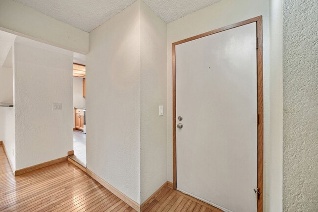 Photo - AVAILABLE NOW! 2BR/2BA Condo – Awesome Location! Glossy Hardwoods, Granite Countertops, W/S/G Inc...