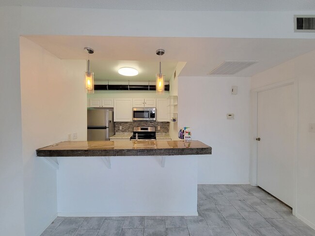 Photo - Spacious one of a kind 2 bedroom 2 bath condo in excellent condition. Entire condo has been paint...