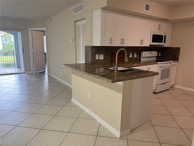 Photo - 9615 NW 1st Ct Condo Unit 10-204